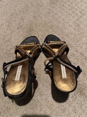 Cynthia Vincent Black and Gold Braided-Strap Sandals